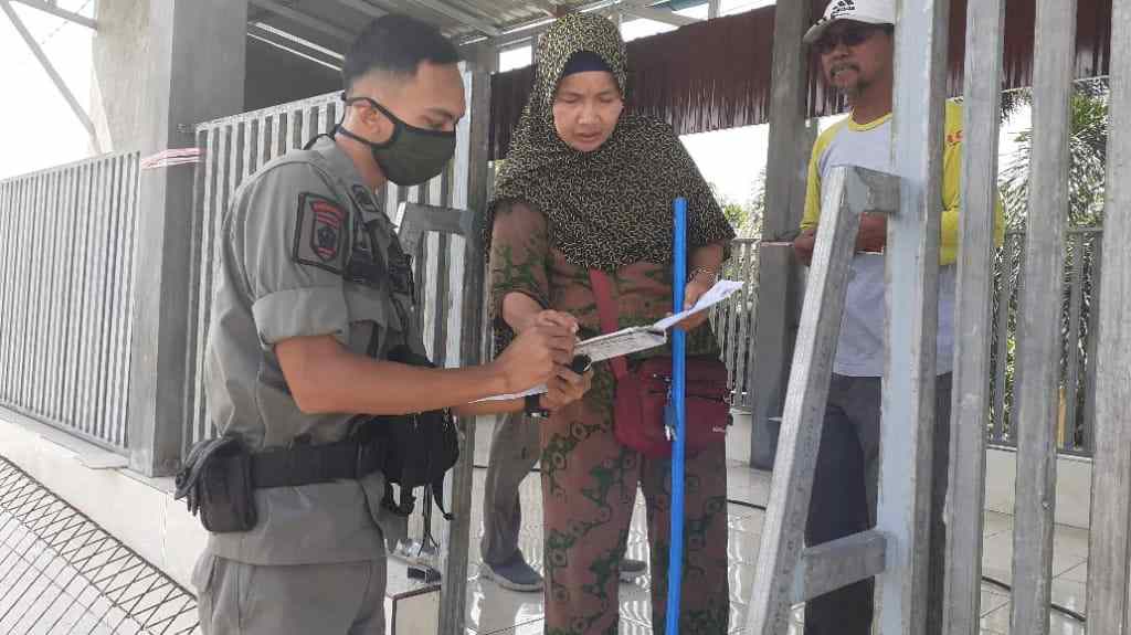  Satpol PP Asahan Layangkan Teguran Kedua Pemilik Bangunan Disamping SPBU Simpang Tanjung Alam 