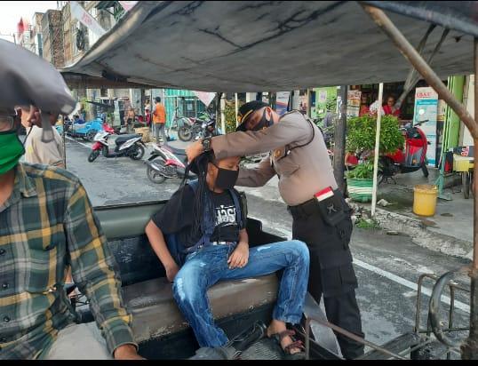Polsek Kota Kisaran Bagikan 1000 Masker Kepada Pengguna Jalan