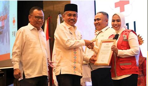 Bupati Labuhanbatu Terima Penghargaan Atas Kontribusi Penanganan Bencana